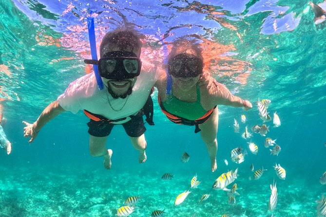 Isla Mujeres Spring Break Party Catamaran Snorkel and Open Bar - Stop by stop: Tortugas to Isla Mujeres, Playa Norte to Playa Centro