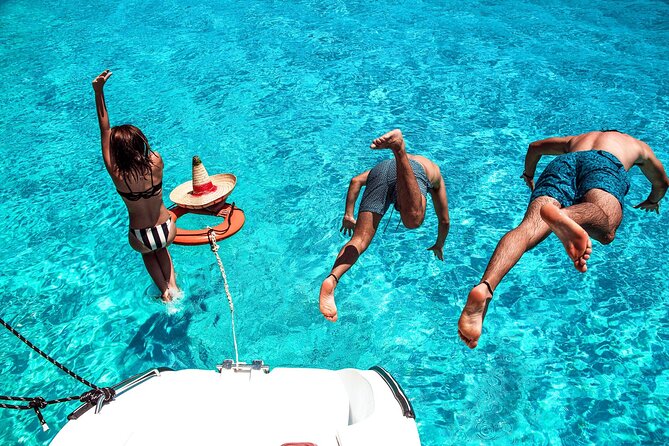 Isla Mujeres Tour on Catamaran with Snorkel, Open Bar, Buffet & Beach club - Snorkeling at El Meco Reef: great value, but it has rules