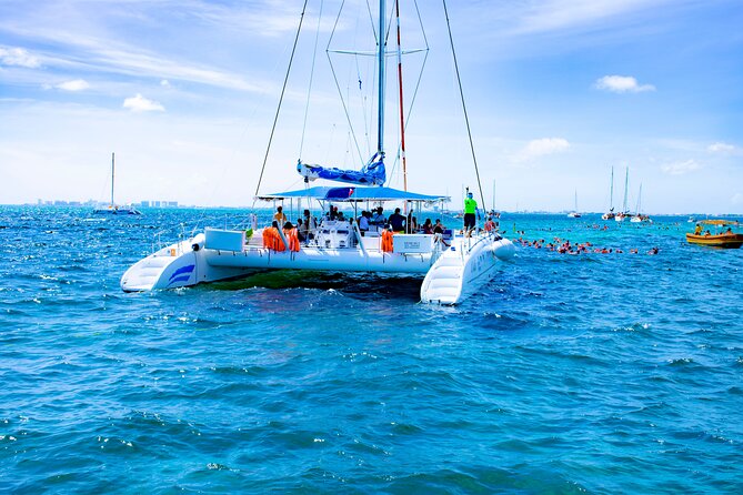 Isla Mujeres Tour on Catamaran with Snorkel, Open Bar, Buffet & Beach club - The catamaran ride itself: games, music, and a very social pace