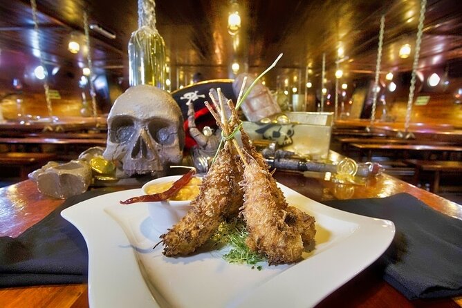 Jolly Roger Pirate Show and Dinner Cruise with Open Bar - Price and practical logistics, including dock fees and transport