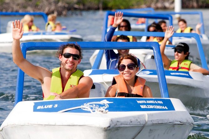 Jungle Tour In Cancun, drive a speedboat through the lagoon with your companion - Punta Nizuc snorkel: reef life plus an underwater museum connection