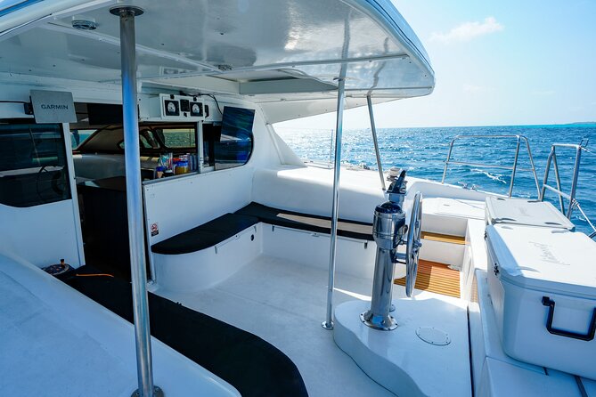 Laura Catamaran Private Tour to Isla Mujeres - Isla Mujeres village time and the golf-cart reality