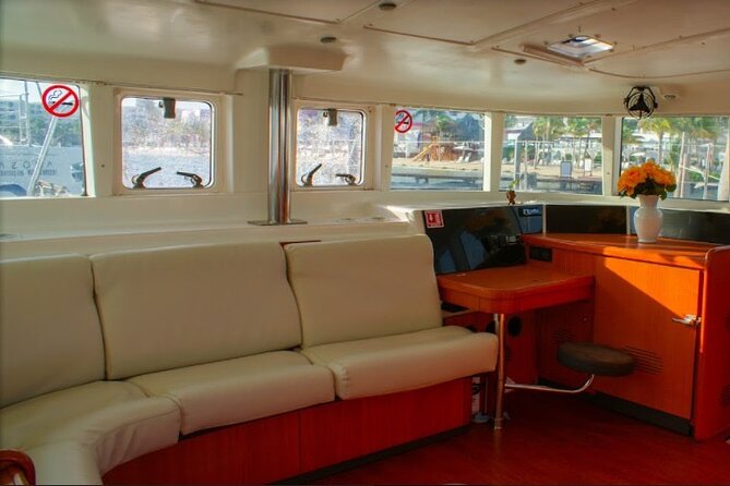 Luxury Catamaran Tour to Isla Mujeres with Transportation - Back to Cancun at Sunset: Music, Drinks, and a Possible Spinnaker