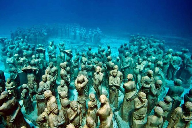 Mujeres Island Tour by Catamaran from Cancun City - Playa Tortugas snorkel stop: what it feels like in practice