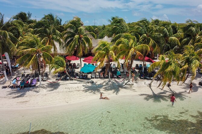 Plus Full Day Catamaran Tour to Isla Mujeres All Inclusive - Isla Mujeres Town and Photos: Center of the Island