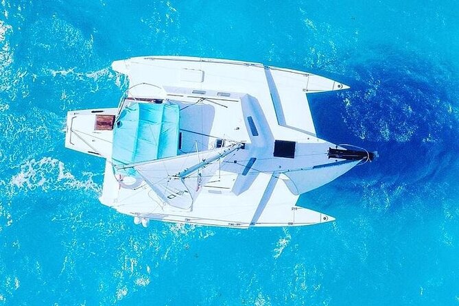 Premium Isla Mujeres Tour by Private Catamaran - Arrecife El Meco reef park snorkeling: Gear included, ticket not