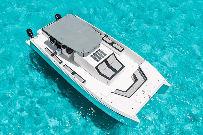 Private Atomic Catamaran Tour to Isla Mujeres - Getting to Playa Tortugas and starting with food