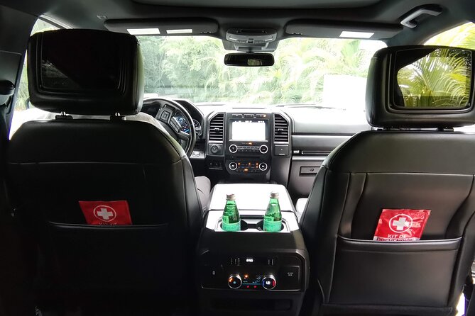 Private Transportation Deluxe Van - Where You Meet: The Sign, Butler On The Go, and the Right Exit Area