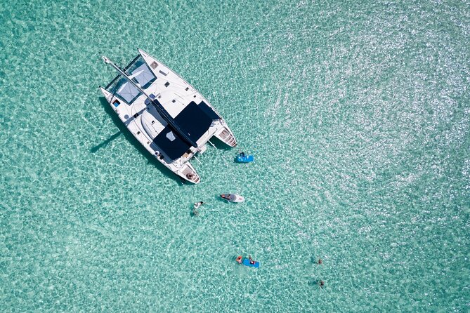 Puerto Morelos Secret Sandbar Catamaran Sail - A family-friendly catamaran day built around the Puerto Morelos sandbar
