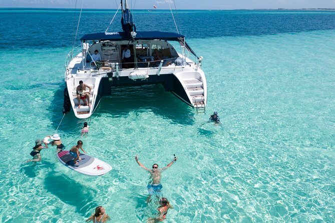 Puerto Morelos Secret Sandbar Catamaran Sail - Lunch, unlimited drinks, towels, and the comfort you do not have to manage