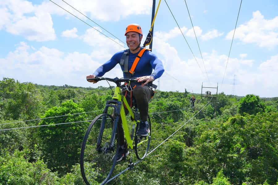 Puerto Morelos: Selvatica Park All-Inclusive Adventure Pass - The cenote swim: the hidden reset after gear and stairs