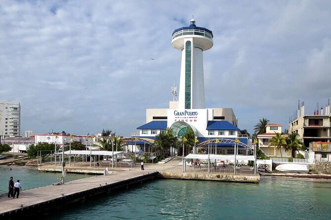 Round Ferry Transfer from Tortugas to Isla Mujeres - Price and Taxes: Is $34.67 Really the Real Cost?