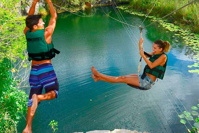 Sacred Adventure at Xenotes! 4 Different Cenotes + Round Transportation - Zip lining and rappelling: fun with clear limits