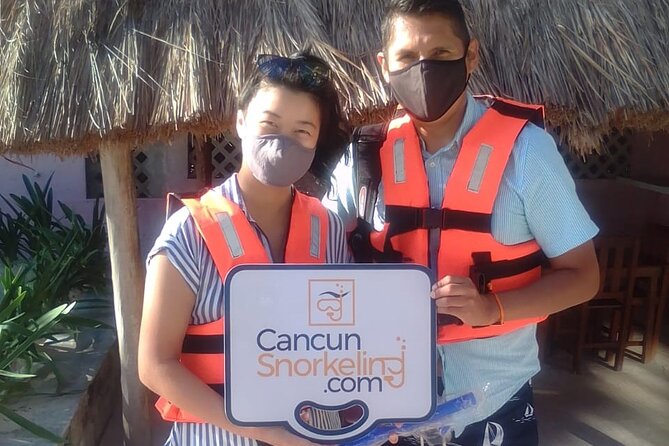 Snorkeling tour Express in Cancun with Certified Guide - Getting on the boat: the practical dock reality