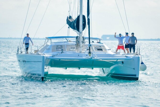 Splendid Isla Mujeres Catamaran: drinks and fun all day! - Snorkeling at Arrecife El Meco: safe, included gear, real water time