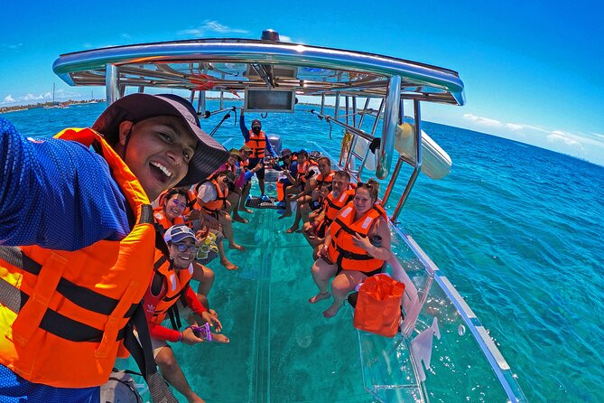 Tour Isla Mujeres excursion in Collective Transparent Boat - Transparent-boat reef viewing in Isla Mujeres, no wet suit required