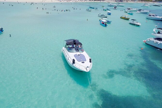 Tour to Isla Mujeres on Premium Yachts from Cancun - Stop 1 in Cancun: snorkeling at El Meco Reef or a shipwreck