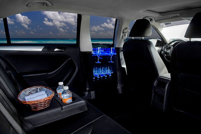 Transfers in Luxury Sedan from Cancun Airport - Cancun Airport Exit Hall: How You Avoid the Scam Sprint