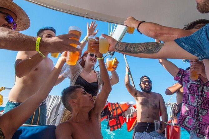 Trip to Isla Mujeres by Catamaran, with snorkeling and drinks - Cancun check-in time: quick start before the fun part