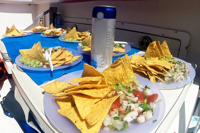 Whale Shark Tour from Cancun, Playa del Carmen, Tulum and Riviera Maya - Playa Norte at Isla Mujeres: Lunch, Warm Water, and a Proper Finish