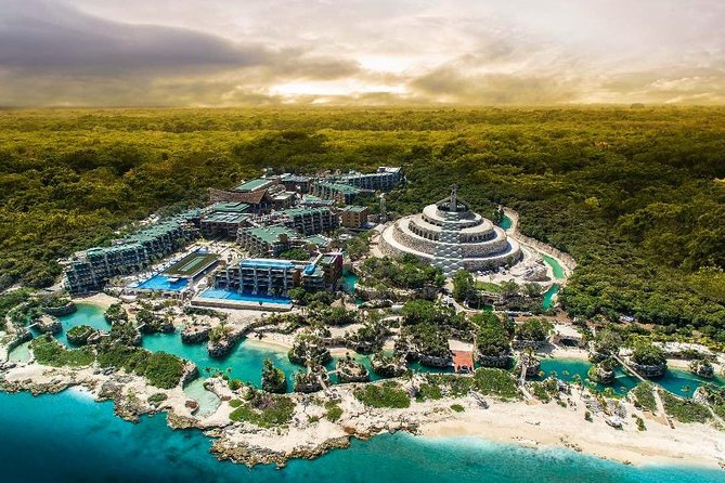 Xcaret Aquatic Theme Park Private 12 hrs Trip from Cancun by van - Pickup that actually works: meet-and-greet plus 15 minutes